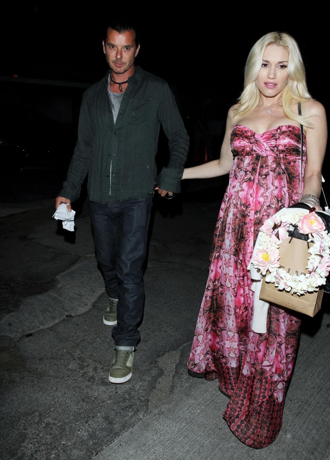 Gwen Stefani shows off her breast implants wearing a strapless dress outside a f #75214226