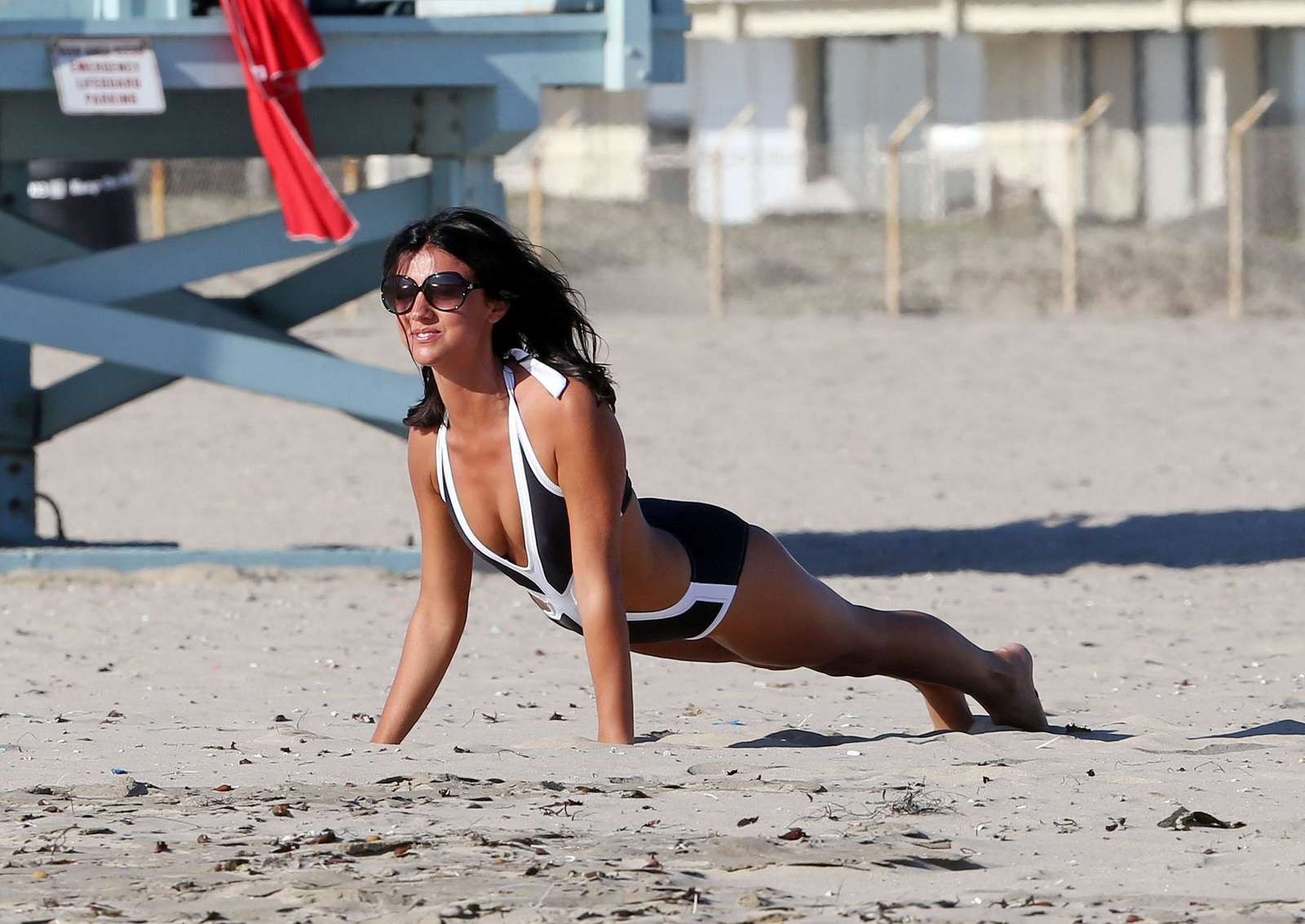 Lucy Mecklenburgh in sexy monokini working out on Santa Monica Beach #75216769