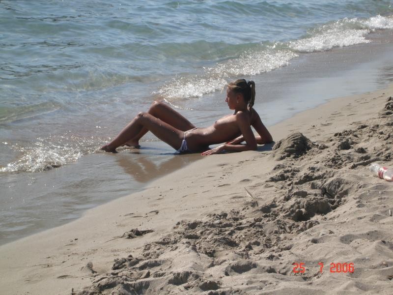 A public beach front heats up with two scorching teen nudists #72252455