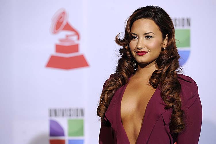 Demi Lovato exposing sexy body and huge cleavage in nice red dress #75282769
