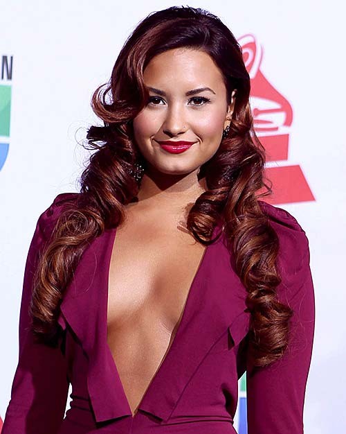 Demi Lovato exposing sexy body and huge cleavage in nice red dress #75282800