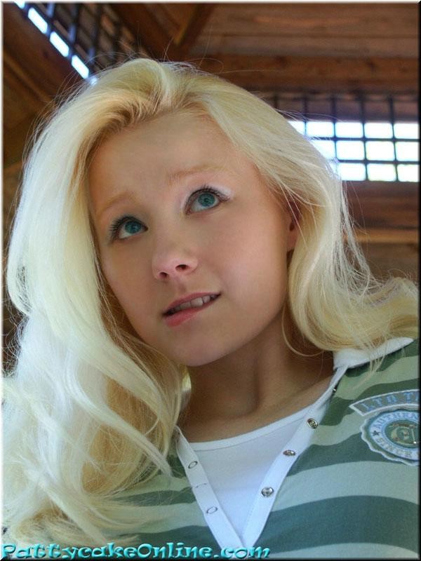 Student in a short skirt bends over outside #73971630