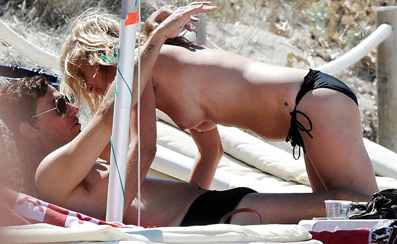 Kate Moss showing tits on vacation and flash panties upskirt #75243999