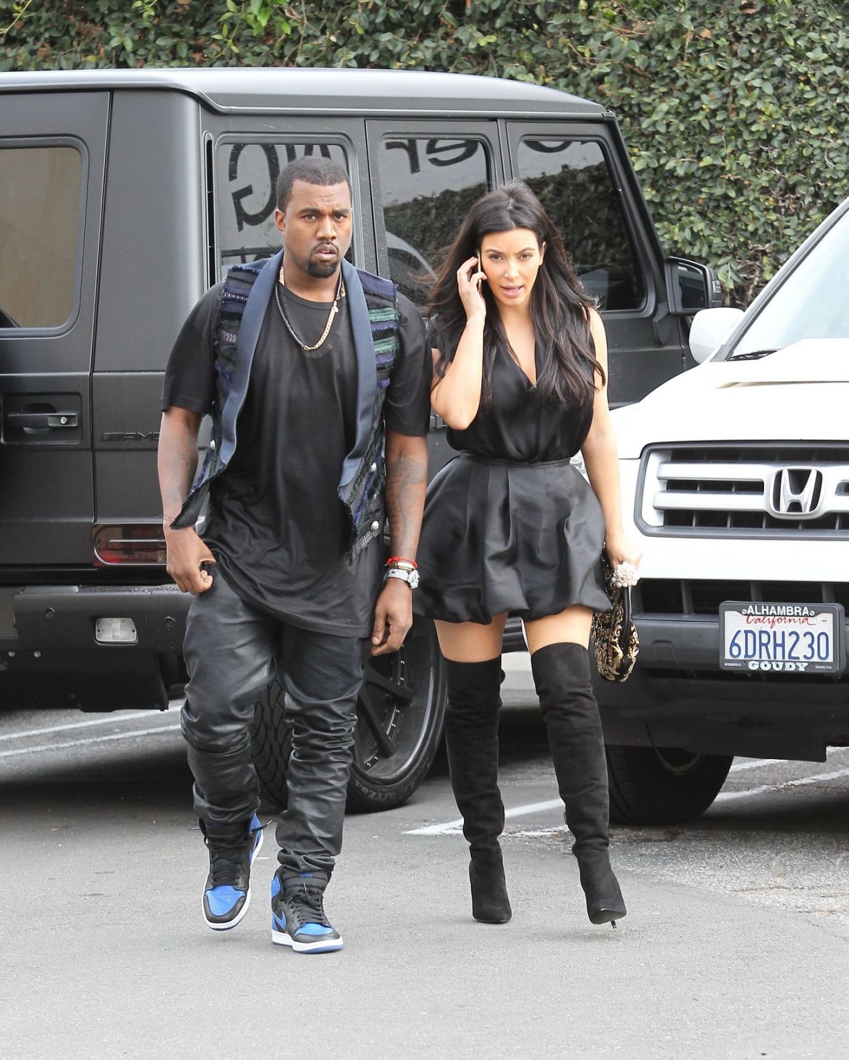 Kim Kardashian cleavy and leggy in black mini dress at Kung Pao Bistro in West H #75245311