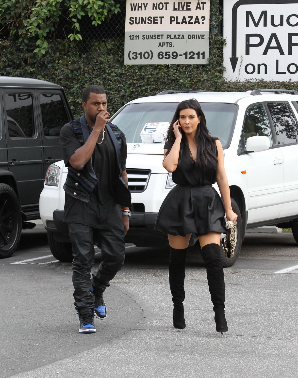 Kim Kardashian cleavy and leggy in black mini dress at Kung Pao Bistro in West H #75245317