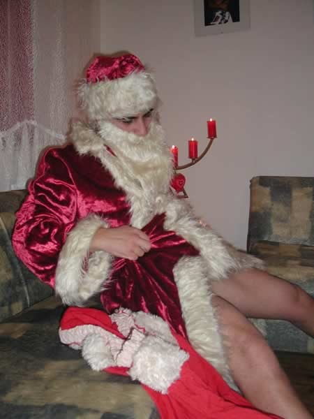 リビングルームで裸になるサンタ
 #77009623