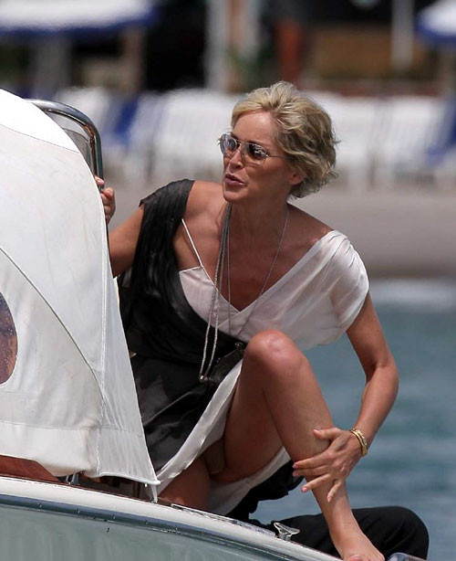 Sharon Stone showing her nice big tits on beach paparazzi pictures #75403126