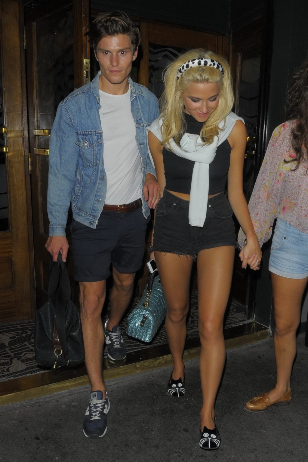 Pixie Lott wearing tight black belly top and shorts night out in London #75223757