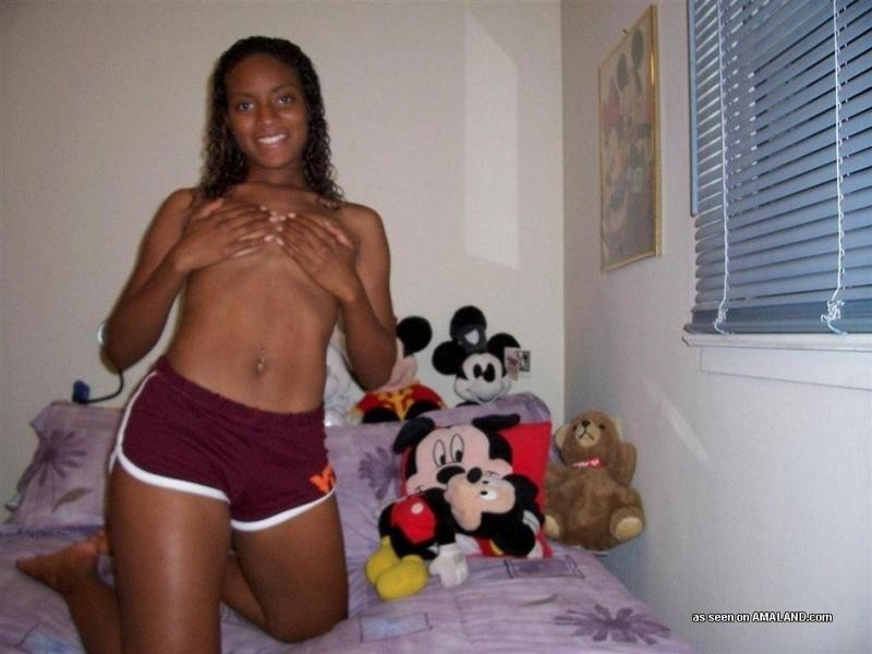Ebony coed strips and fingers her cunt in photo collection #75776845