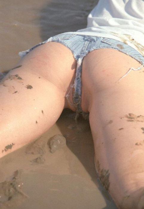 Beautiful amateur gal laying in mud #76623829