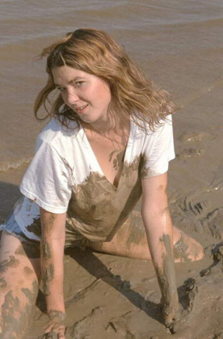 Beautiful amateur gal laying in mud #76623877