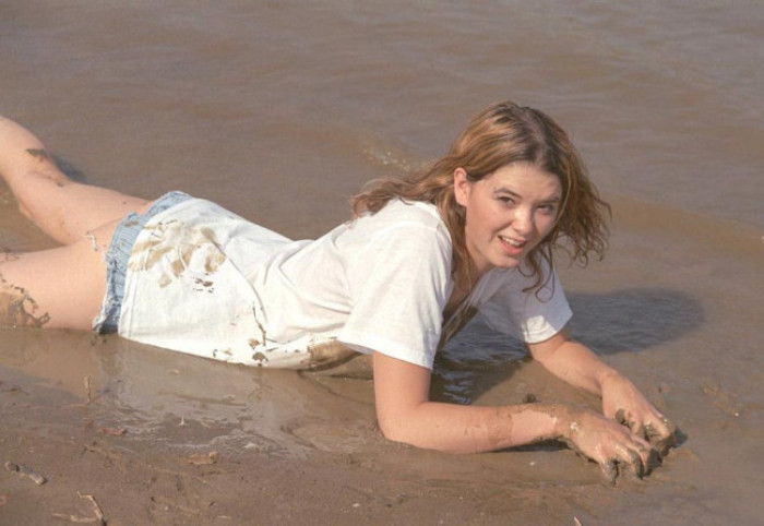 Beautiful amateur gal laying in mud #76623900