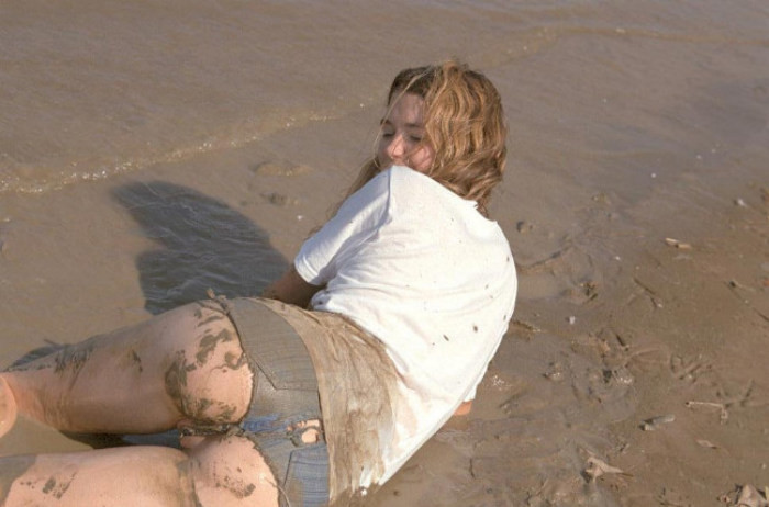 Beautiful amateur gal laying in mud #76623911