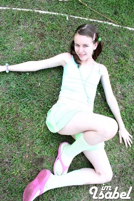 Small teen girl in short skirt and pigtails #74871676