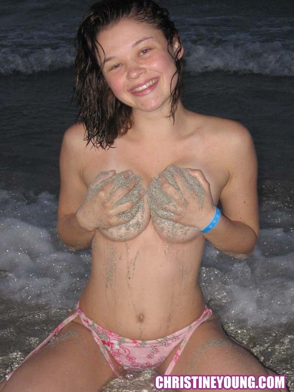 Amazing teen Christine Young flashing her tits on the beach #73103052