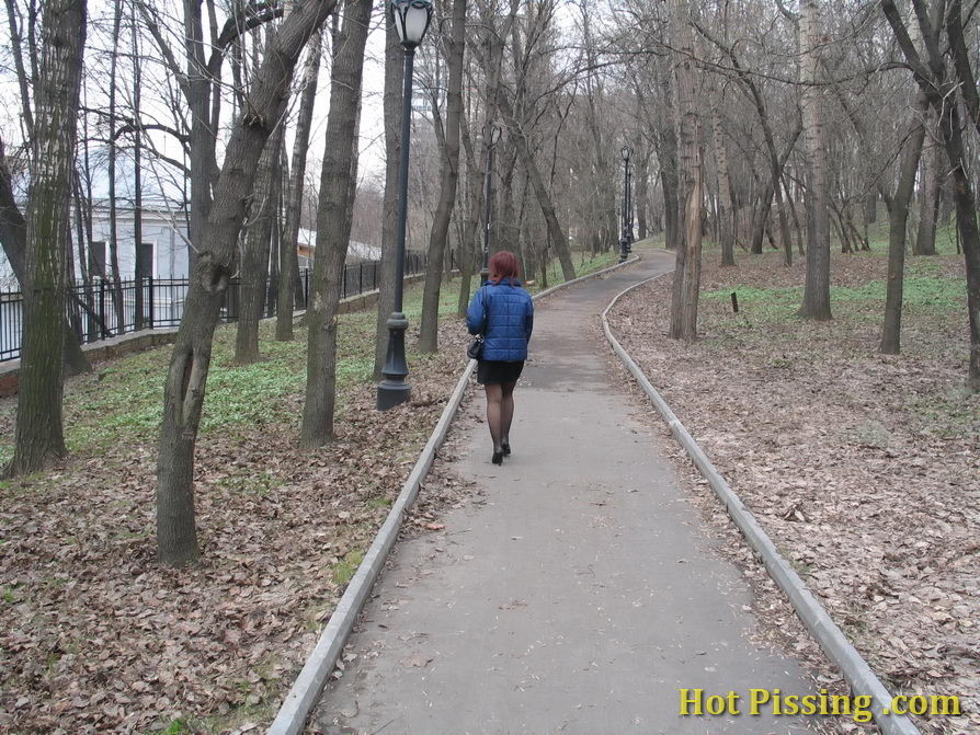 Girl in stockings caught on spy cam while peeing in the autumn street #76567231