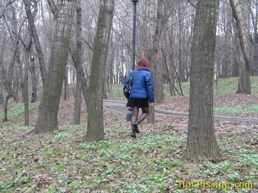 Girl in stockings caught on spy cam while peeing in the autumn street #76567376