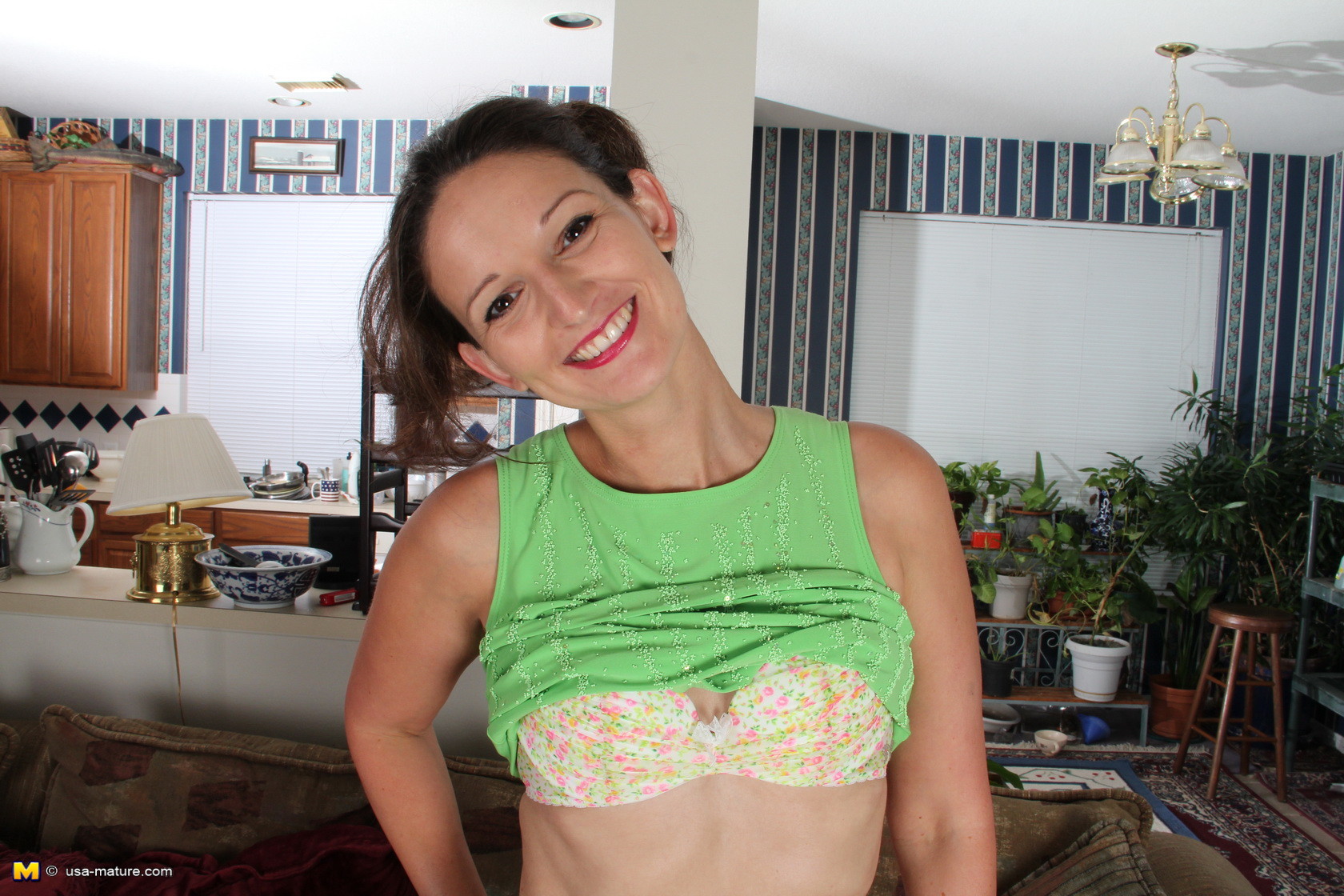 Cute American housewife stripping at dwelling #72374627