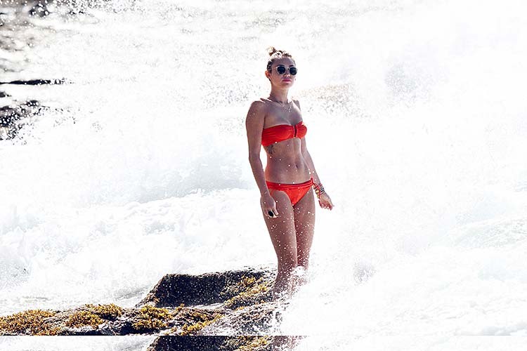 Miley Cyrus looking very sexy and hot in red bikini on beach #75277785