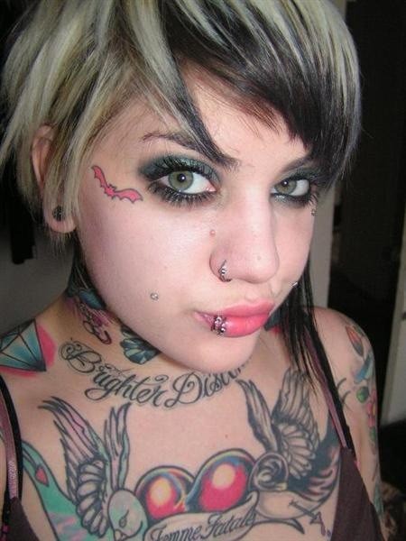 Extreme tattoo and piercing #73234809