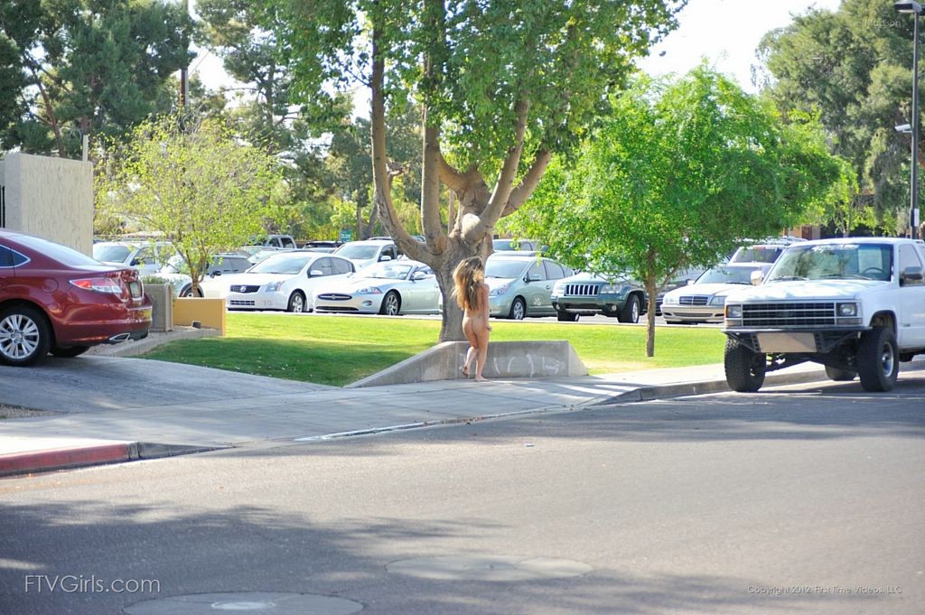 Petite teen streaks nude across from busy gas station #67289199