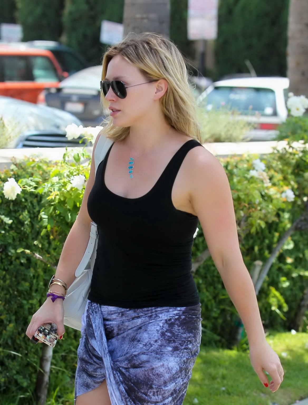 Hilary Duff cleavy and leggy in a tank top and skirt strolling around in Los Ang #75188788