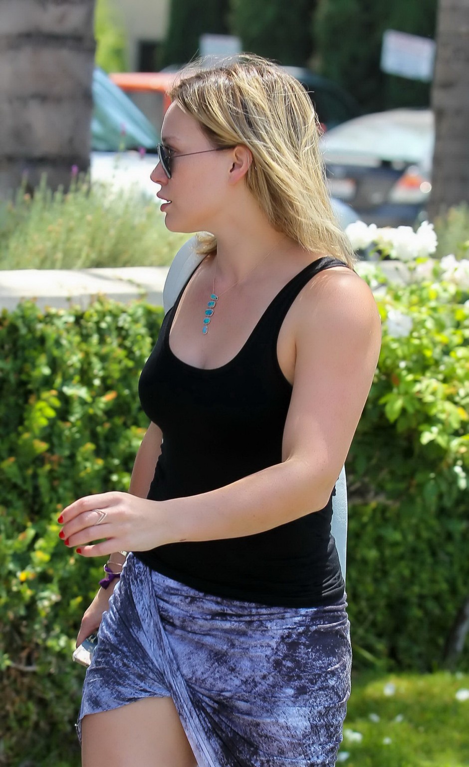 Hilary Duff cleavy and leggy in a tank top and skirt strolling around in Los Ang #75188818