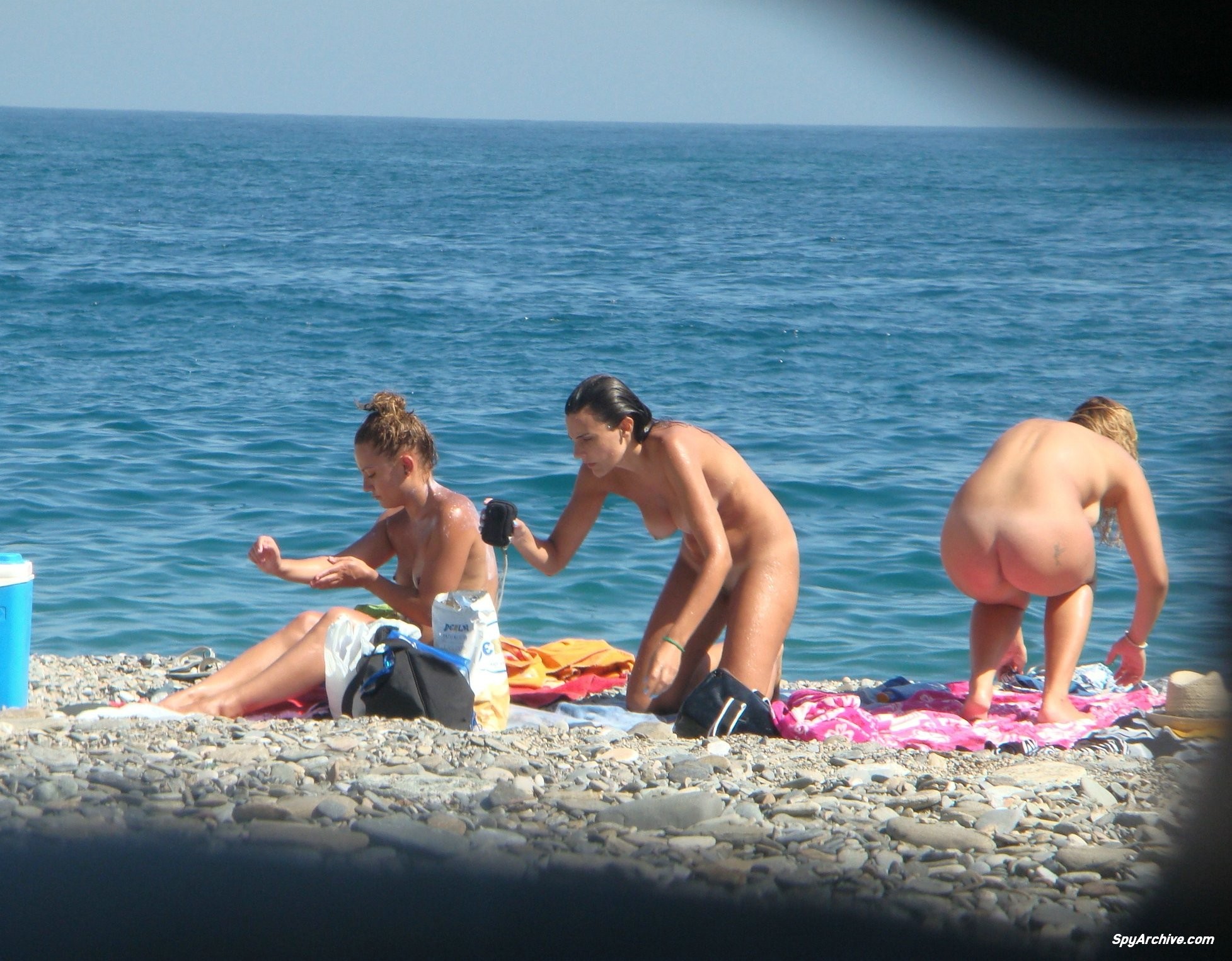 Spy shots of a hot nude girl spreading at the beach #70755159