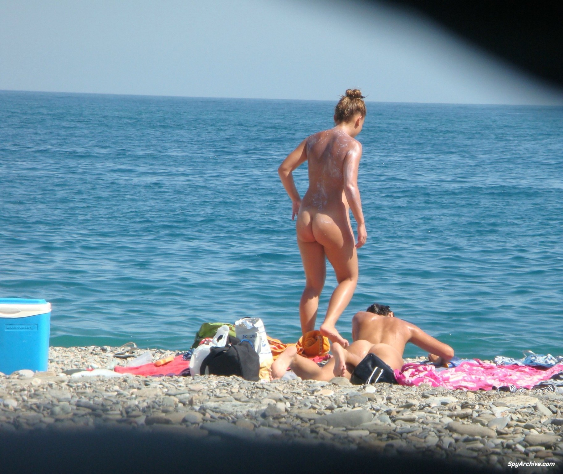 Spy shots of a hot nude girl spreading at the beach #70755219