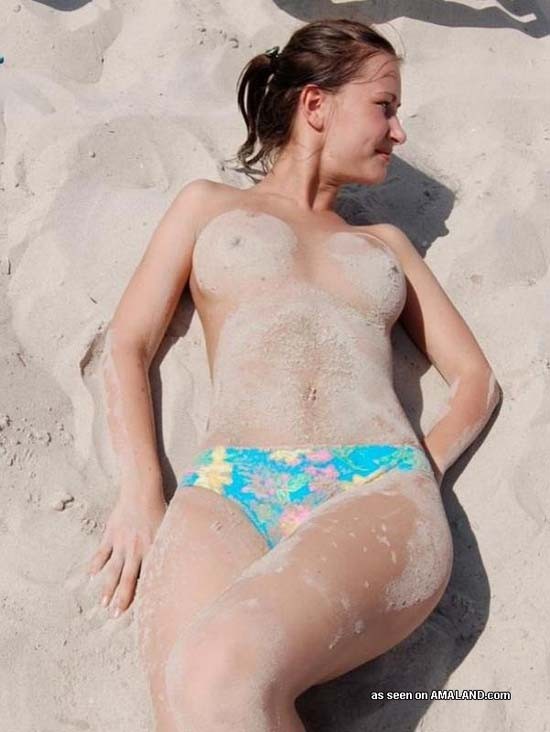 Demonstrating her boobies at the beach #72249864