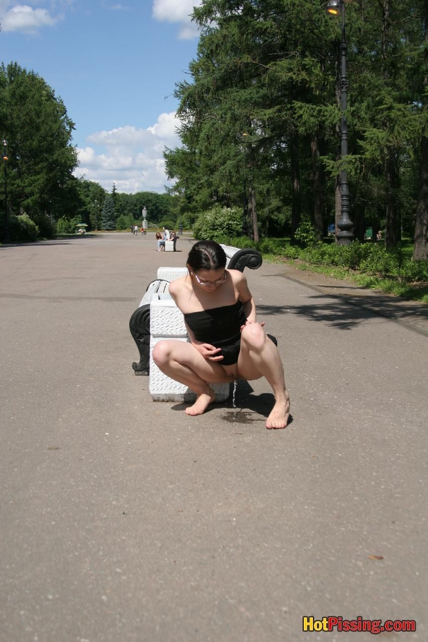 Summer beauty wants to piss so strong that does it next to a bench #76523125