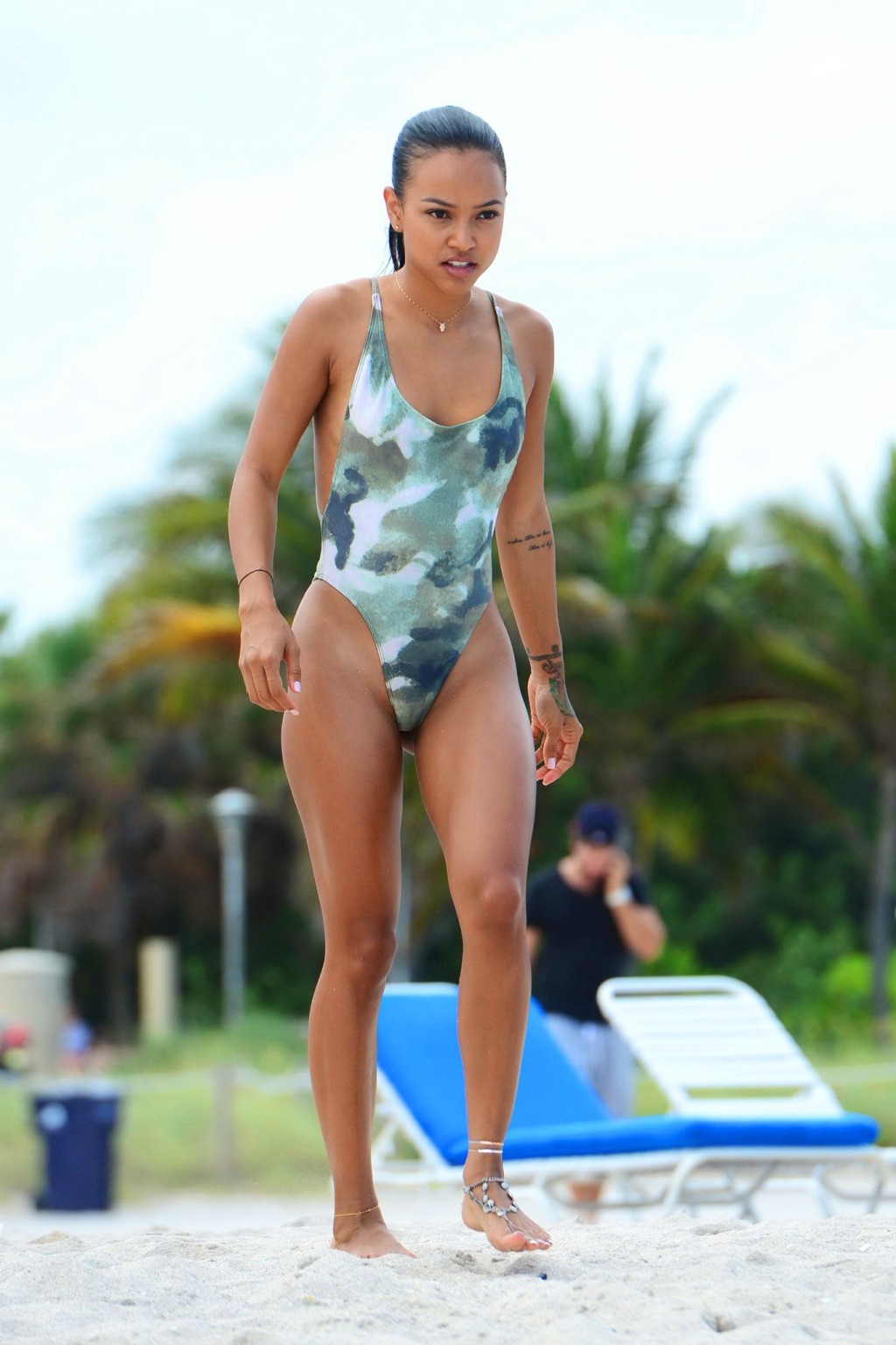 Karrueche Tran shows sideboob and ass in tiny camo swimsuit at the beach #75161139
