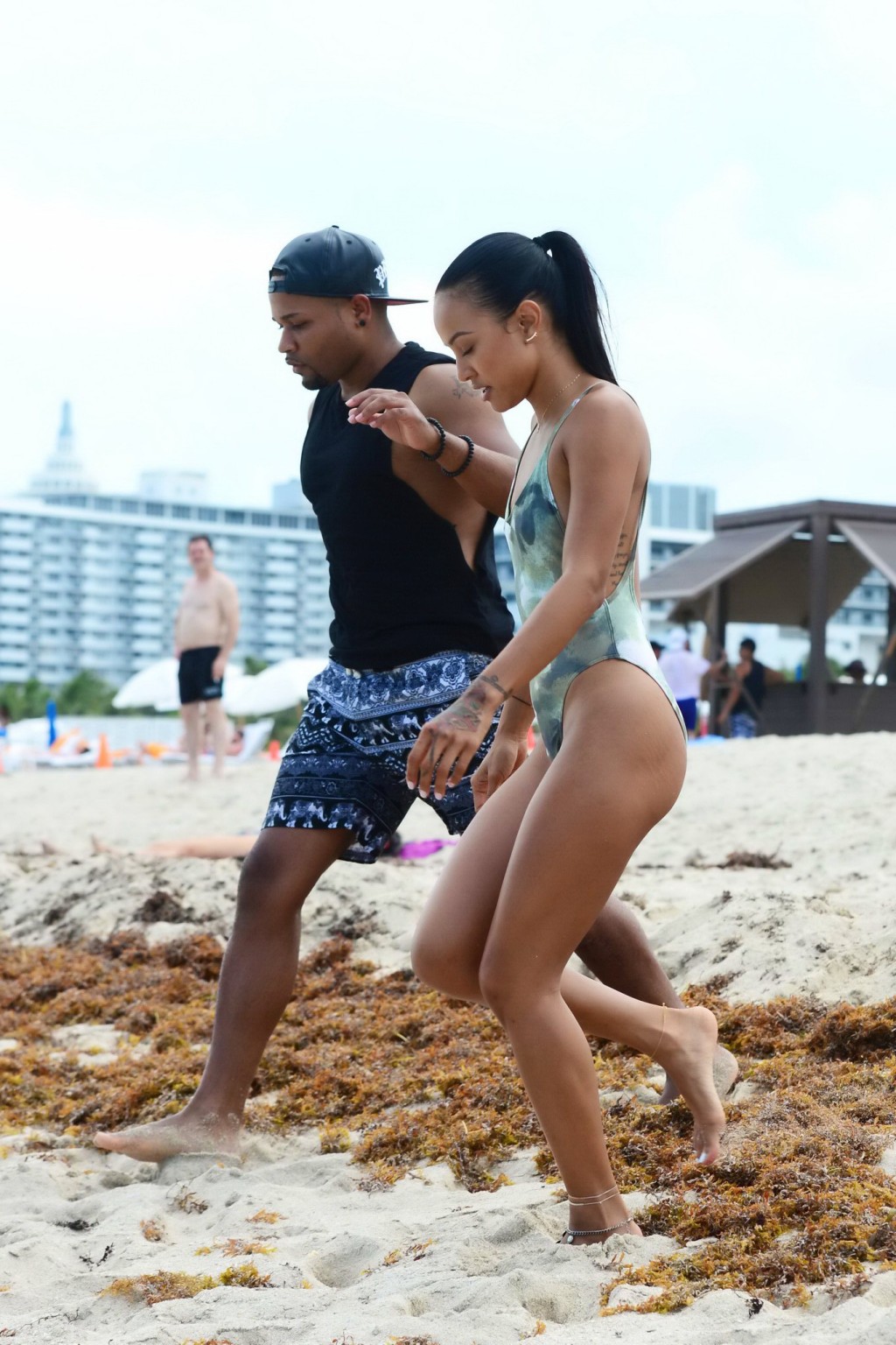 Karrueche Tran shows sideboob and ass in tiny camo swimsuit at the beach #75161163