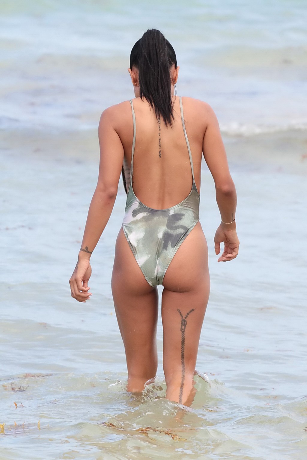 Karrueche Tran shows sideboob and ass in tiny camo swimsuit at the beach #75161172