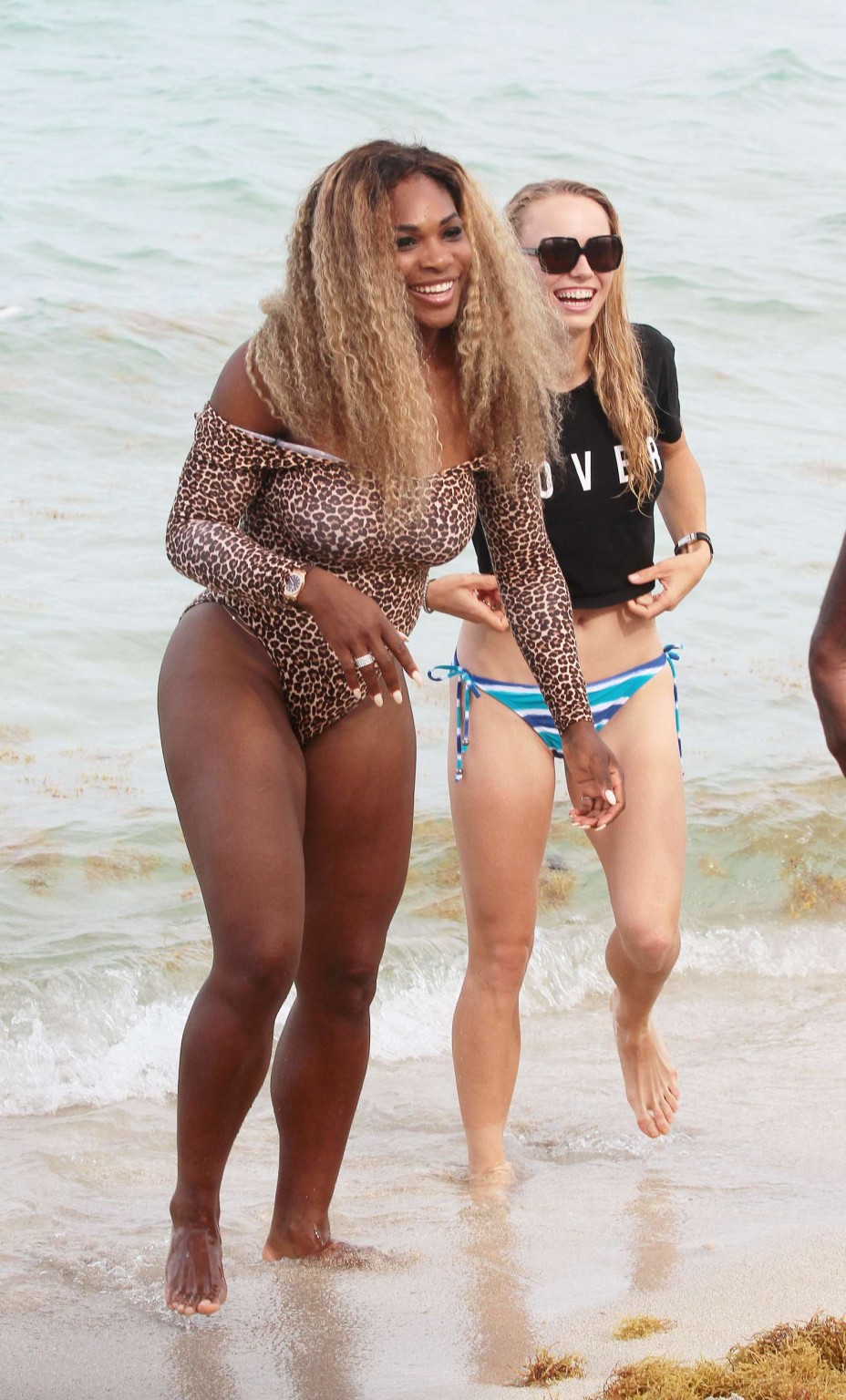 Serena Williams shows off her curvy body wearing a leopard print swimsuit on a b #75194769
