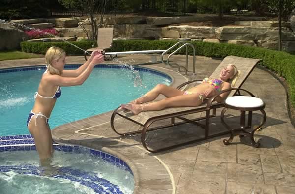 Two blonde lesbains in a swimming pool #70703557