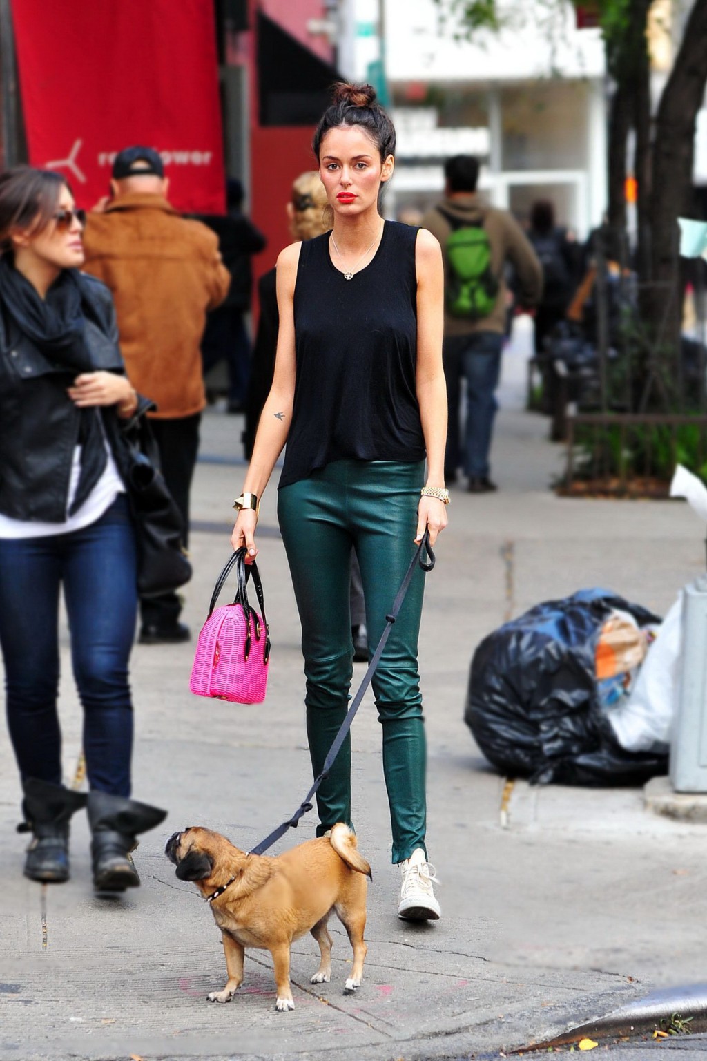 Nicole Trunfio bra peak while petting her doggy out in Soho #75250626