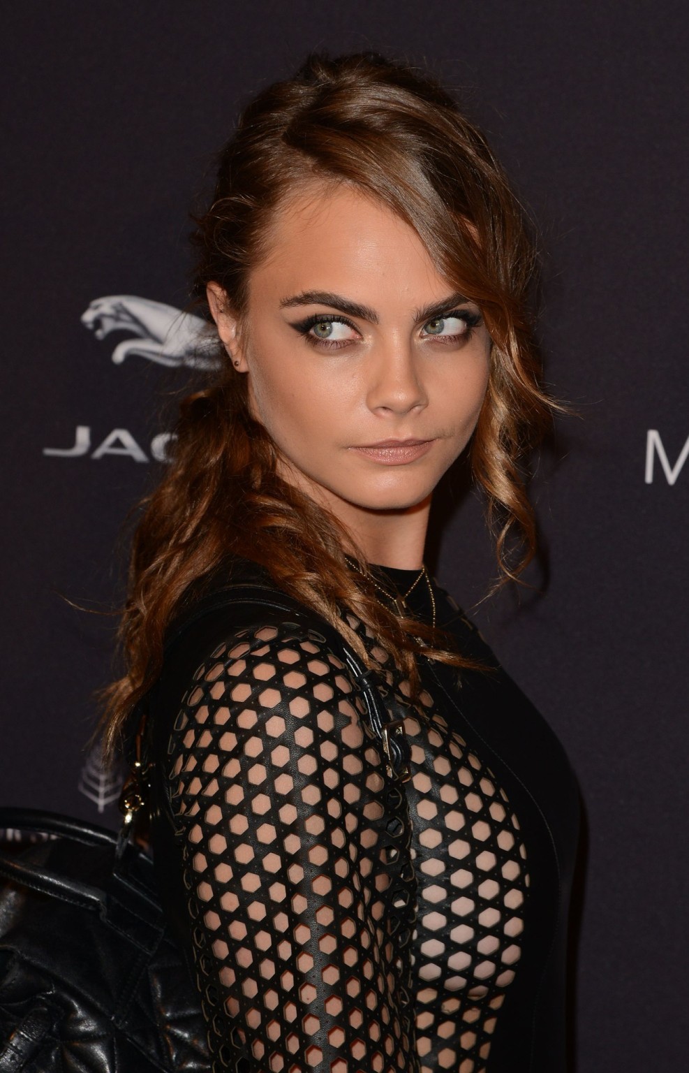 Cara Delevingne shows sideboobs wearing a partially see through leather dress at #75175785