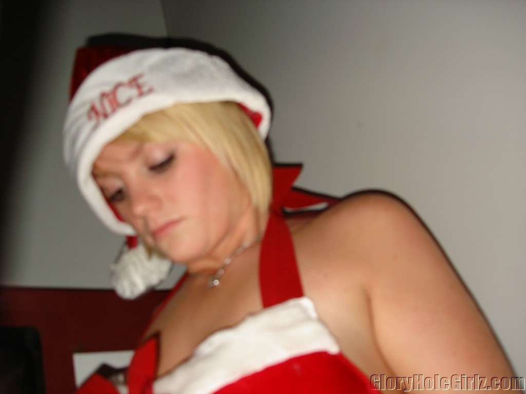 Busty babe showing off the spirit of Xmas at gloryhole #79100321