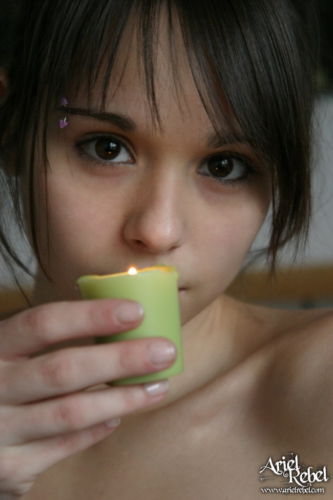 Ariel Rebel plays with candles #67603786