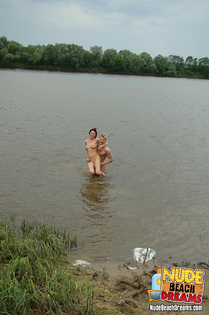 Nudist party on the river #67371028