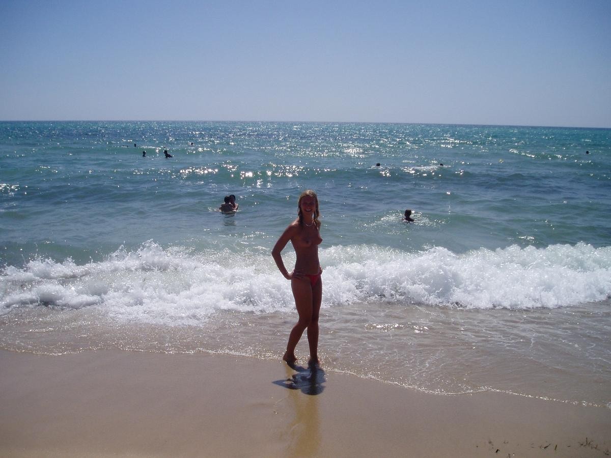 Candid beach teens  beach voyeur photos topless sunbathing  #67254059
