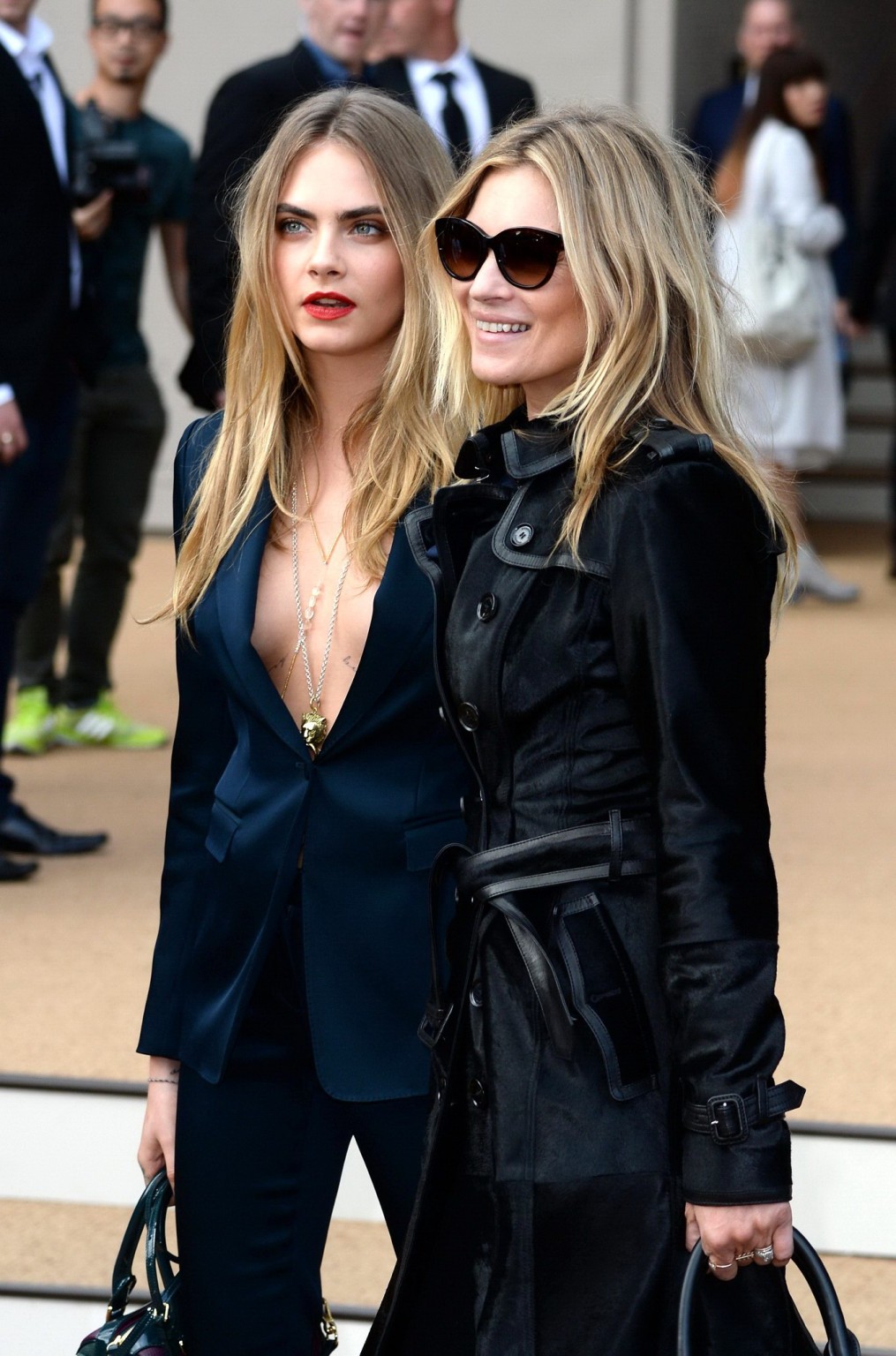 Cara Delevingne braless wearing a wide open jacket at the Burberry Prorsum show  #75185616