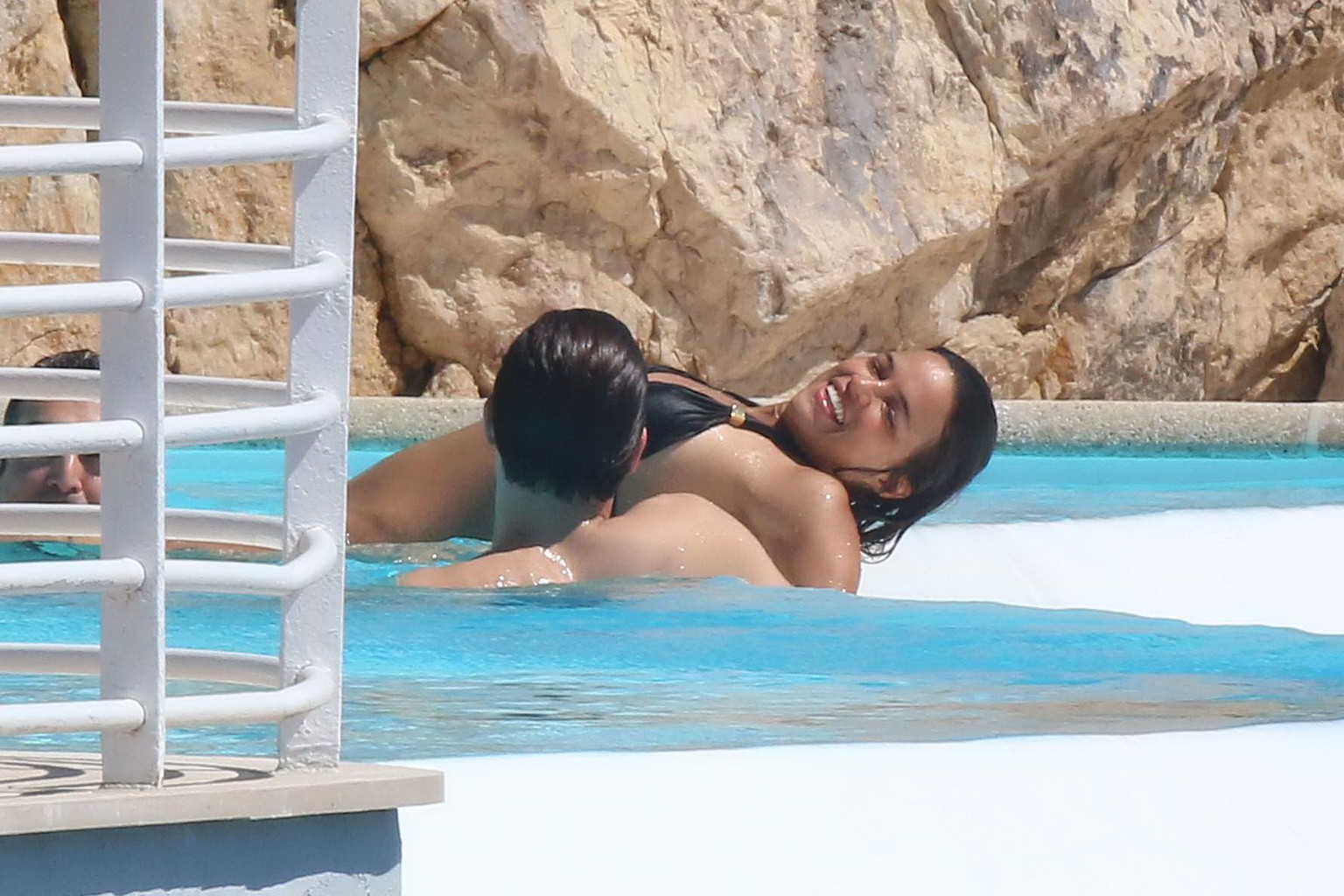 Michelle Rodriguez wearing skimpy black bikini poolside at Cap Eden Roc Hotel in #75195641