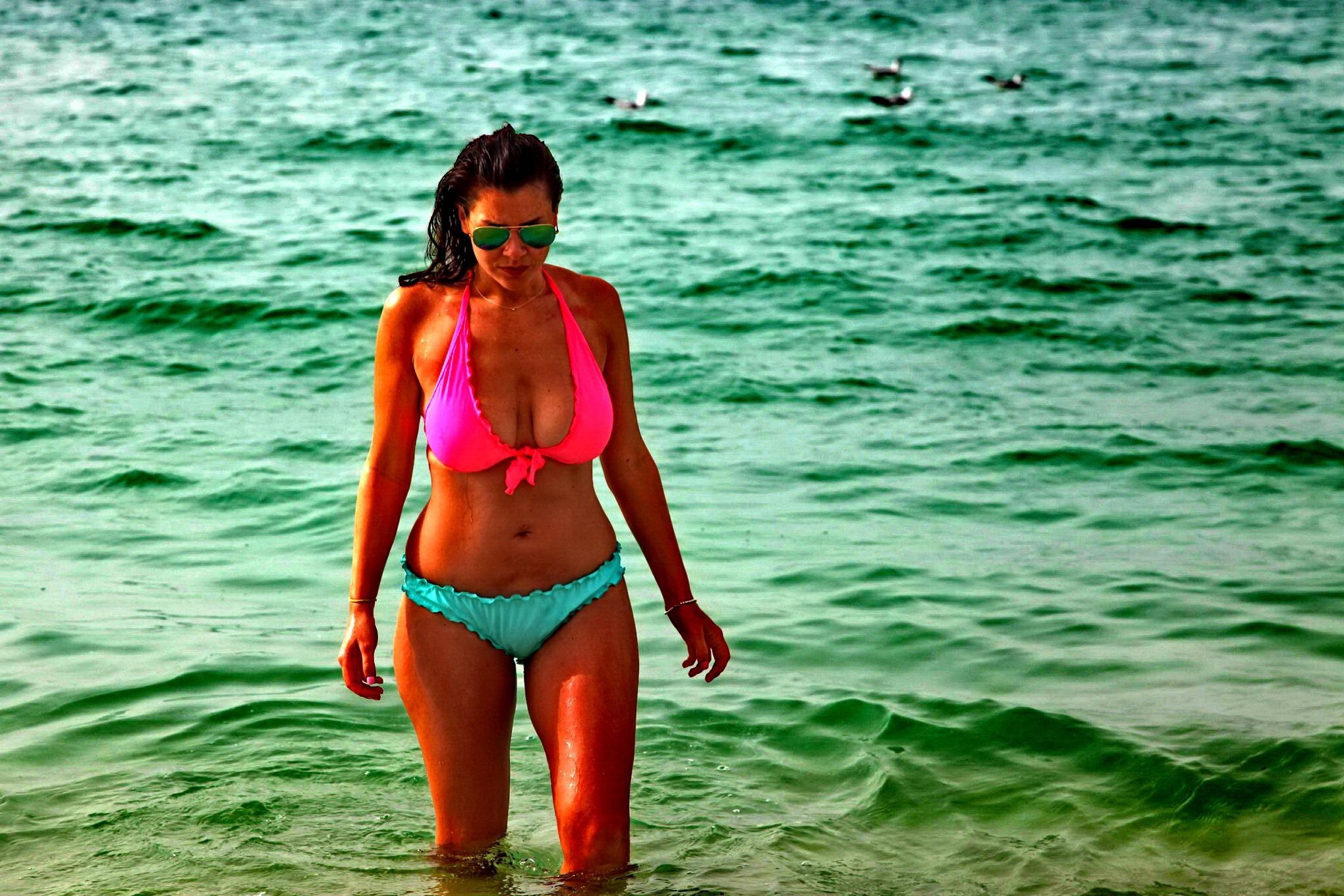 Busty Imogen Thomas wearing a two color bikini on a beach in Dubai #75204773
