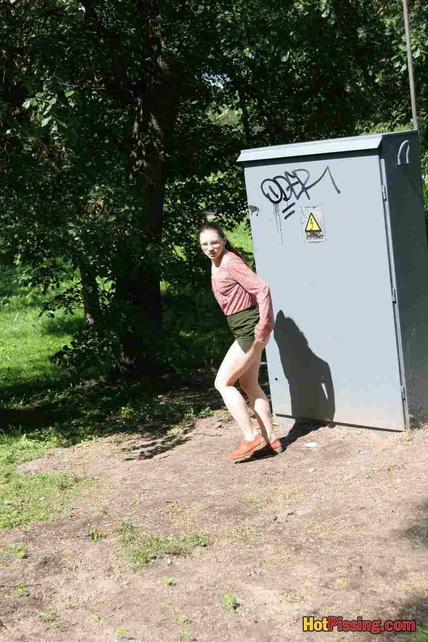 Girl pissing outdoors #76525753