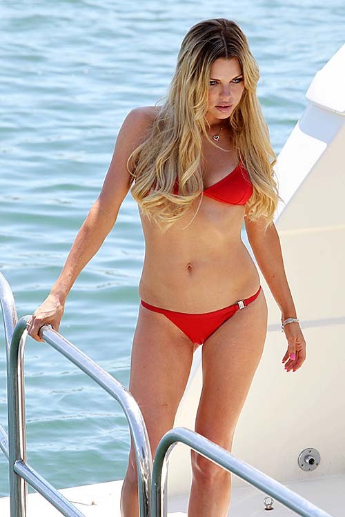 Sophie Monk exposing sexy body and hot ass in red bikini on yacht #75286641