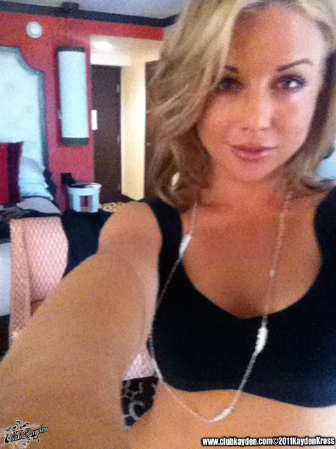 Kayden Kross playing with her phone camera at home #70323701