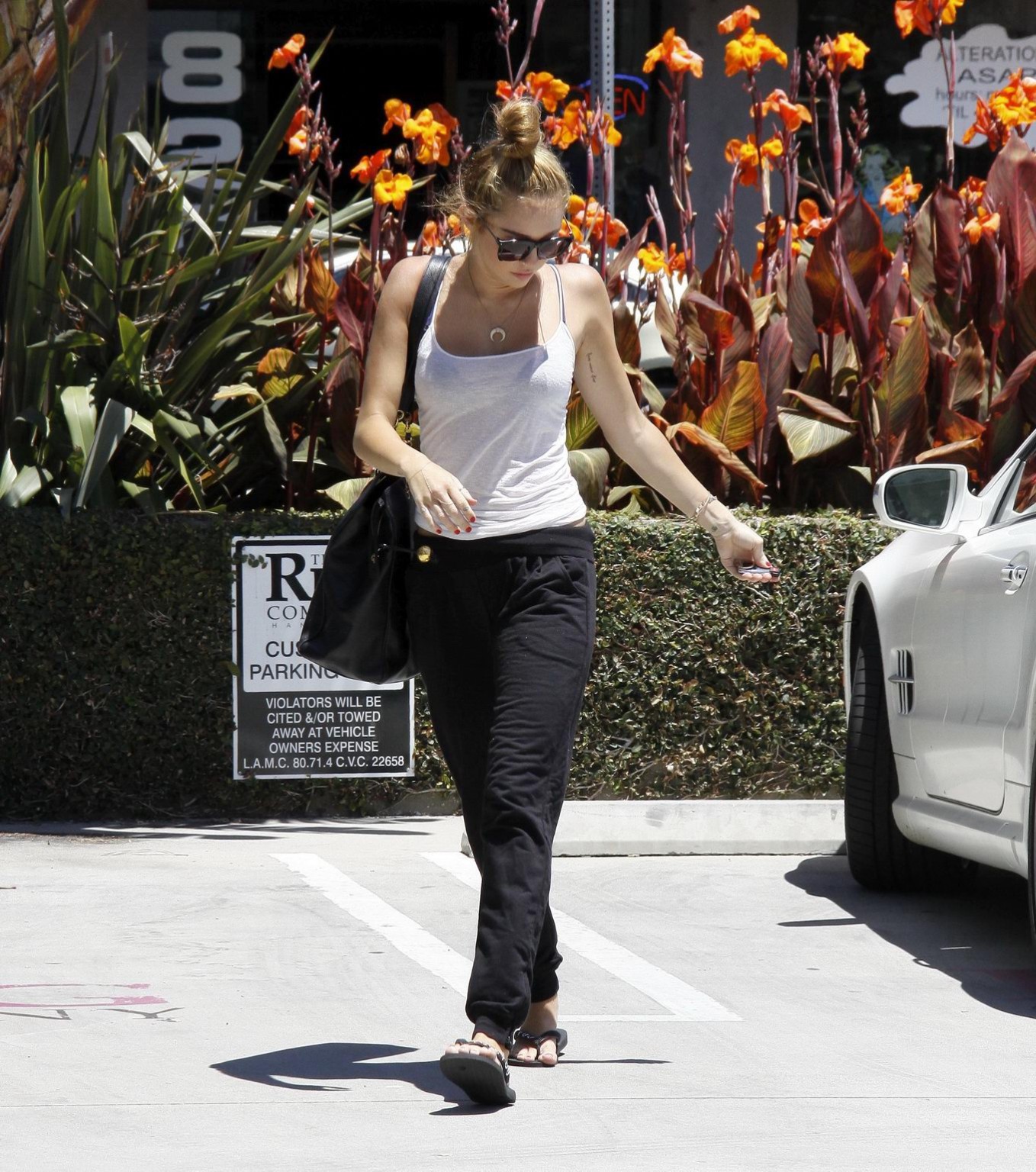 Miley Cyrus see through to bra out in Beverly Hills #75258413