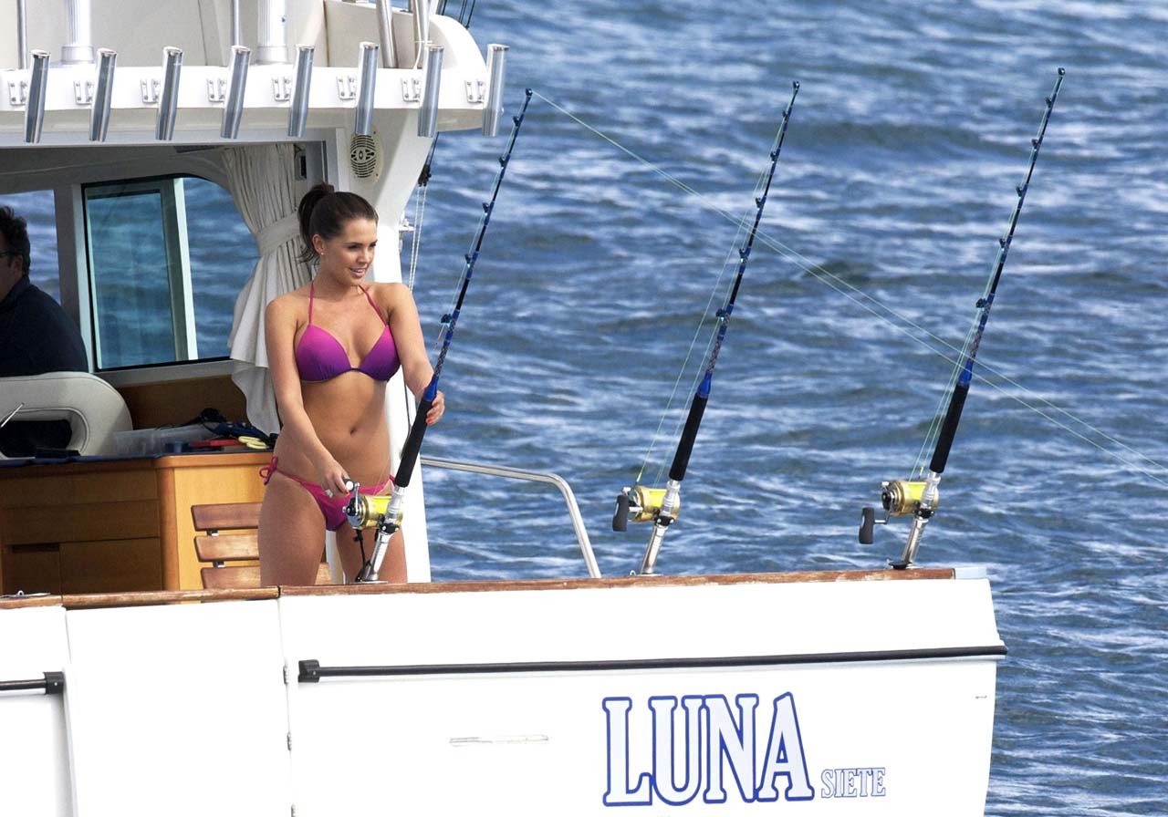 Danielle Lloyd fishing in violet bikini and looking sexy paparazzi pictures #75316222